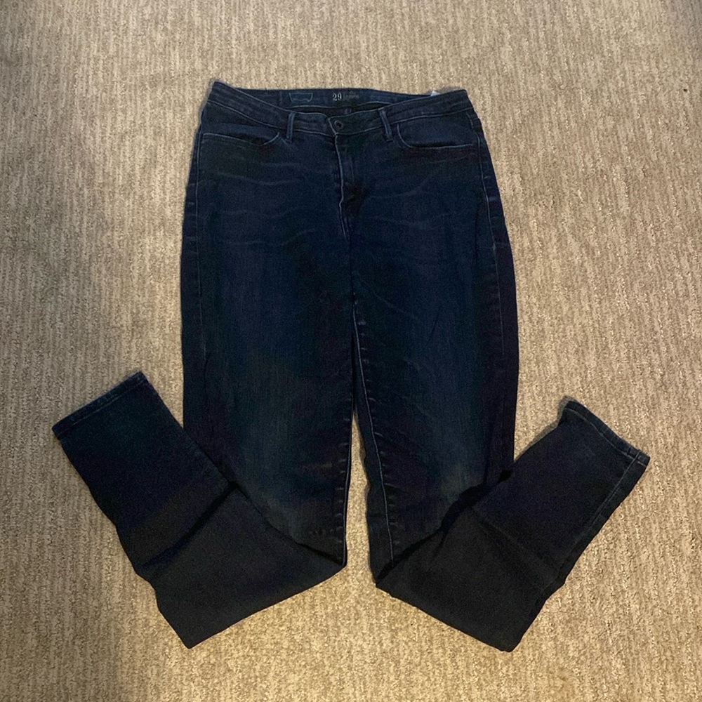 Dark denim leggings by Levi